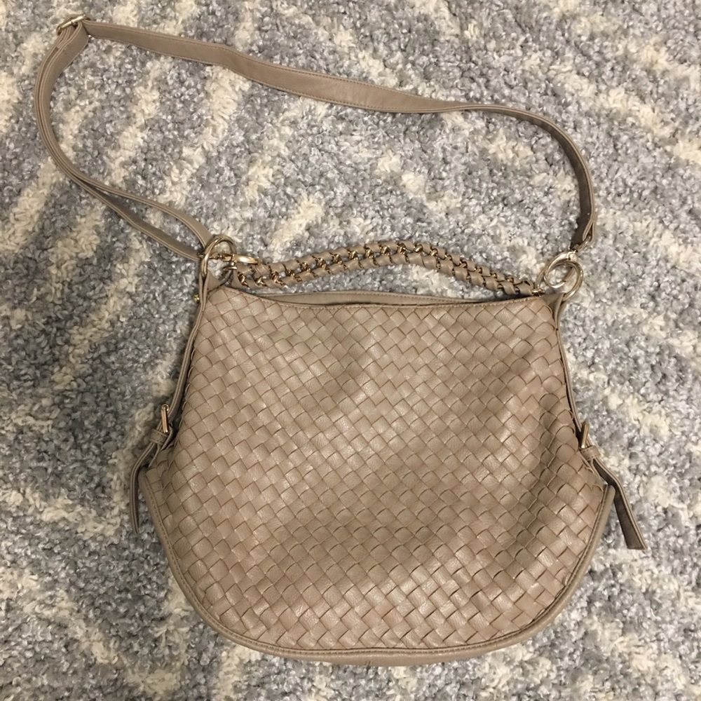 Purse beige/taupe in color